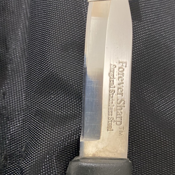 NWOT KAI PROfessional Chef 7-piece Cutlery set with 8 Pocket Roll - Picture 13 of 14